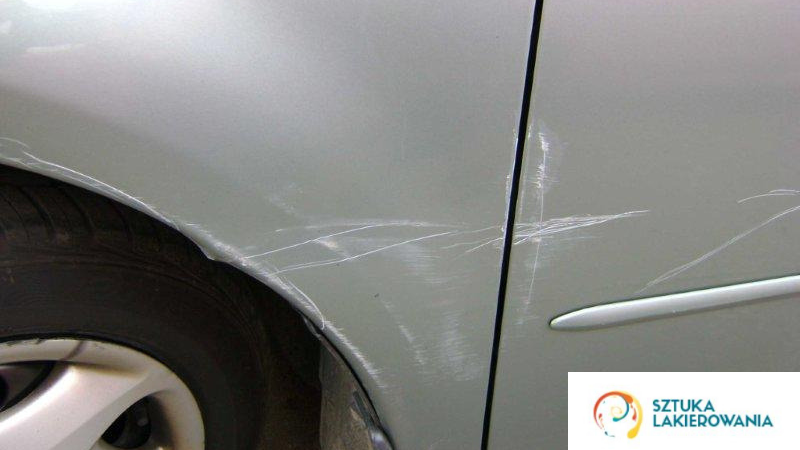 usługi lakiernicze - Ełk, Warszawa, Białystok, SztukaLakierowania - porysowane nadkole, wymagane lakierowanie nadkola Opel